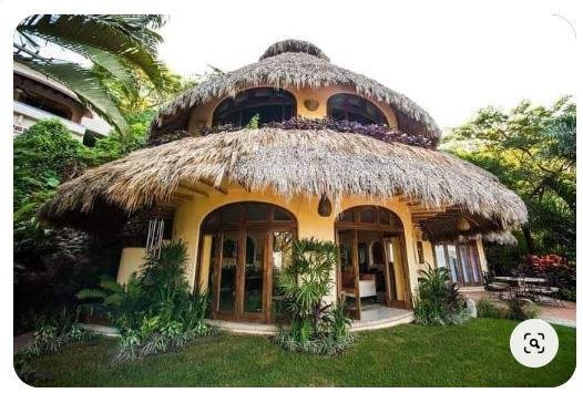 Mud House Reference Model 003 – Layered thatch retreat